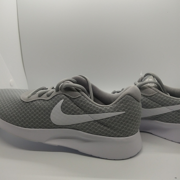 white and grey nike shoes